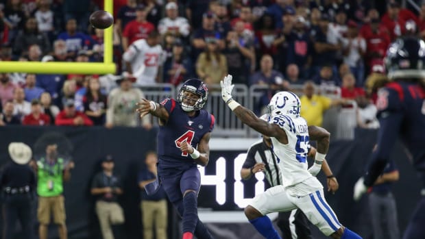 Houston Texans quarterback Deshaun Watson passes while getting pressure from Indianapolis Colts linebacker Darius Leonard in a 2019 game in Houston.